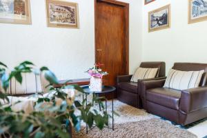 Posezení v ubytování Apartma Roner