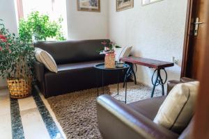 Posezení v ubytování Apartma Roner