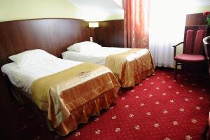 Posteľ alebo postele v izbe v ubytovaní Hotel Kalchem