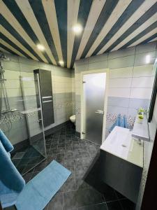 Koupelna v ubytování Seto Apartment