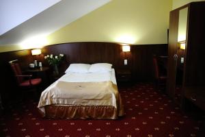 Posteľ alebo postele v izbe v ubytovaní Hotel Kalchem