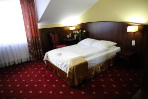Posteľ alebo postele v izbe v ubytovaní Hotel Kalchem