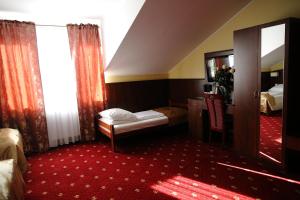 Posteľ alebo postele v izbe v ubytovaní Hotel Kalchem