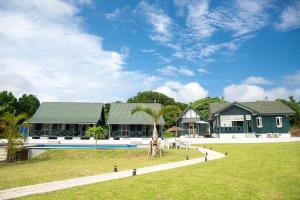 Bazén v ubytování AK Resort ISHIGAKI nebo v jeho okolí