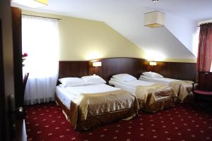 Posteľ alebo postele v izbe v ubytovaní Hotel Kalchem