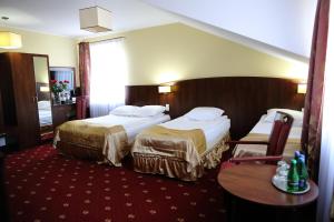 Posteľ alebo postele v izbe v ubytovaní Hotel Kalchem
