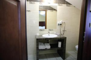 Kúpeľňa v ubytovaní Hotel Kalchem
