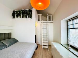Posteľ alebo postele v izbe v ubytovaní Evergreen Sopot House