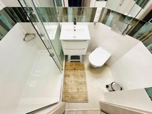 Kúpeľňa v ubytovaní Evergreen Sopot House + 26 fotografií