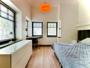 Posteľ alebo postele v izbe v ubytovaní Evergreen Sopot House