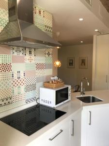 Kuchyňa alebo kuchynka v ubytovaní Urban House Siurot 33