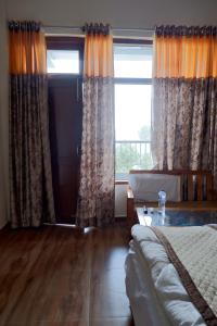 Afbeelding uit fotogalerij van HIM VIEW RETREAT in Rānīkhet