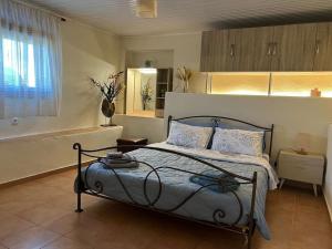 Postel nebo postele na pokoji v ubytování Daras House