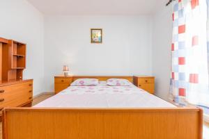 Posteľ alebo postele v izbe v ubytovaní Holiday House Anica