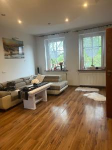 Posezení v ubytování Apartament Muszelka