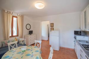 Kuchyň nebo kuchyňský kout v ubytování Le Case di Simonetta - HelloElba