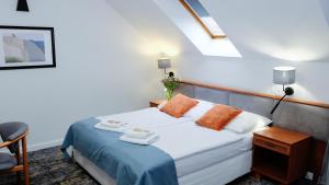 Łóżko lub łóżka w pokoju w obiekcie Hotel Rezydencja AS & Spa-Najwyżej w Karpaczu