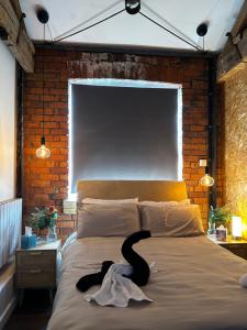 Säng eller sängar i ett rum på Industrial Escape -Kelham Island