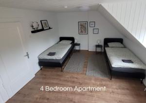 Giường trong phòng chung tại Cozy Apartment in Bedburg-Hau