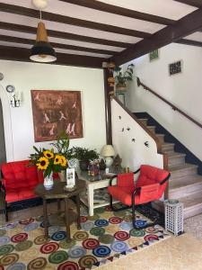 Ein Sitzbereich in der Unterkunft Casa SanAndo Integrative Medicine Treat & ReTreat Center