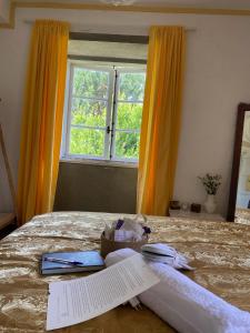Ein Bett oder Betten in einem Zimmer der Unterkunft Casa SanAndo Integrative Medicine Treat & ReTreat Center