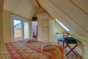 A bed or beds in a room at Il Colombé B&B