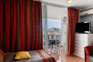 TV a/nebo společenská místnost v ubytování Sol y Playa