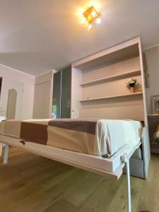 a bedroom with a large bed in a room at Bandol A Bandol cha cha cha - Appartement in Bandol