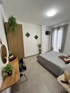 Postel nebo postele na pokoji v ubytování PortAzzurra + 4 fotografie