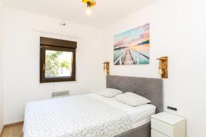 Ένα ή περισσότερα κρεβάτια σε δωμάτιο στο Isabella