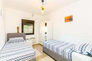 Ένα ή περισσότερα κρεβάτια σε δωμάτιο στο Isabella