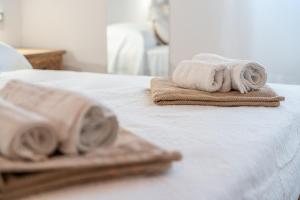 Postel nebo postele na pokoji v ubytování Domo Papiros B&B