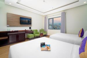 Letto o letti in una camera di Alani Sea View Hotel