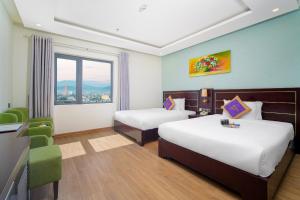 Letto o letti in una camera di Alani Sea View Hotel