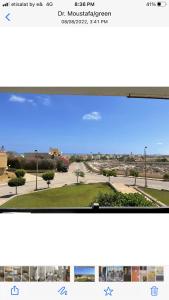 ein Screenshot eines Computerbildschirms mit einem Bild eines Parks in der Unterkunft الميرغني مصر الجديده in El-Alamein
