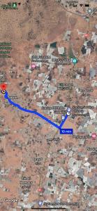 a map of a desert with a blue trail at Riad Targante Takate 1 in Sidi Bibi