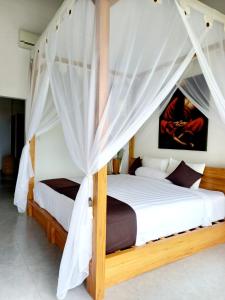 Кровать или кровати в номере Villa Luna Resort