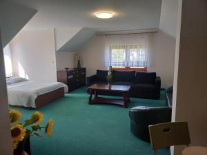 Posteľ alebo postele v izbe v ubytovaní Apartamenty LeVilla