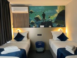 Voodi või voodid majutusasutuse Elberg Hotel & Apartments toas