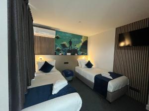 Voodi või voodid majutusasutuse Elberg Hotel & Apartments toas