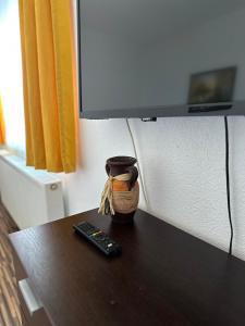TV tai viihdekeskus majoituspaikassa Apartmani Neretvica Ostrožac