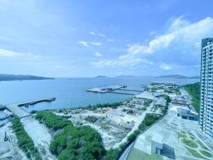 an aerial view of a large body of water at Loveable Home JESSELTON QUAY NEAR SURIA SABAH 亞庇晴文旅 in Kota Kinabalu