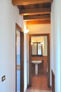 a bathroom with a sink and a mirror at Montecasciano - Ciclamino in Capranica +41 photos