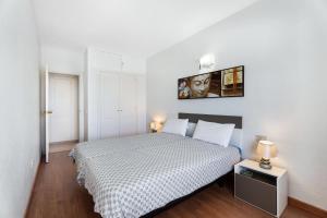 Postel nebo postele na pokoji v ubytování Edificio Nautilus