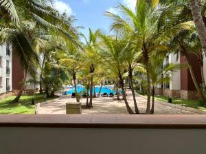 Πισίνα στο ή κοντά στο Luxurious 3-Bedroom Ground Floor Apartment with Pool View in Prestigious Villagio