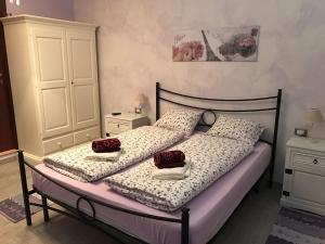 Postel nebo postele na pokoji v ubytování Domo Papiros B&B