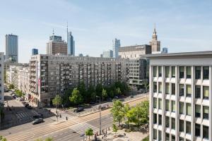 an aerial view of a city with tall buildings at Wspólna City View Studio in Warsaw