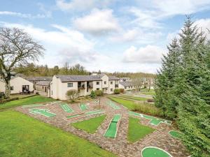 an aerial view of a yard with a house at Mallard Cottage Lake District, Leisure Spa Pool & Gym in Penruddock