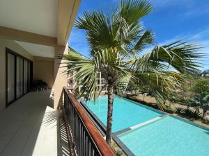 Bazén v ubytování Coralpoint Gardens Suites & Residences nebo v jeho okolí