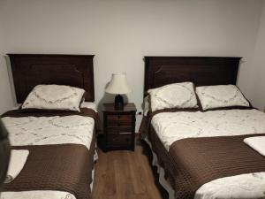 HOTEL QUINTA ESTACIÓN客房内的一张或多张床位